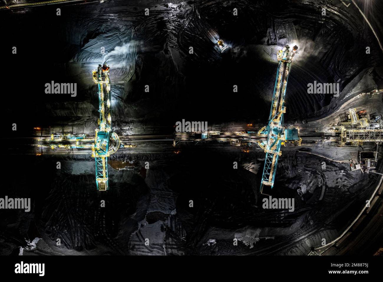 Rotary shovel at coal pile, bulk shipping terminal, silos, grain