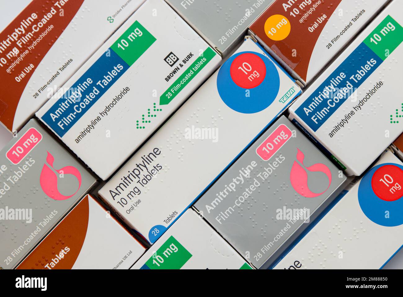 Boxes of various generic brands of 10mg Amitriptyline Hydrochloride tablets in diagonal flat-lay Stock Photo