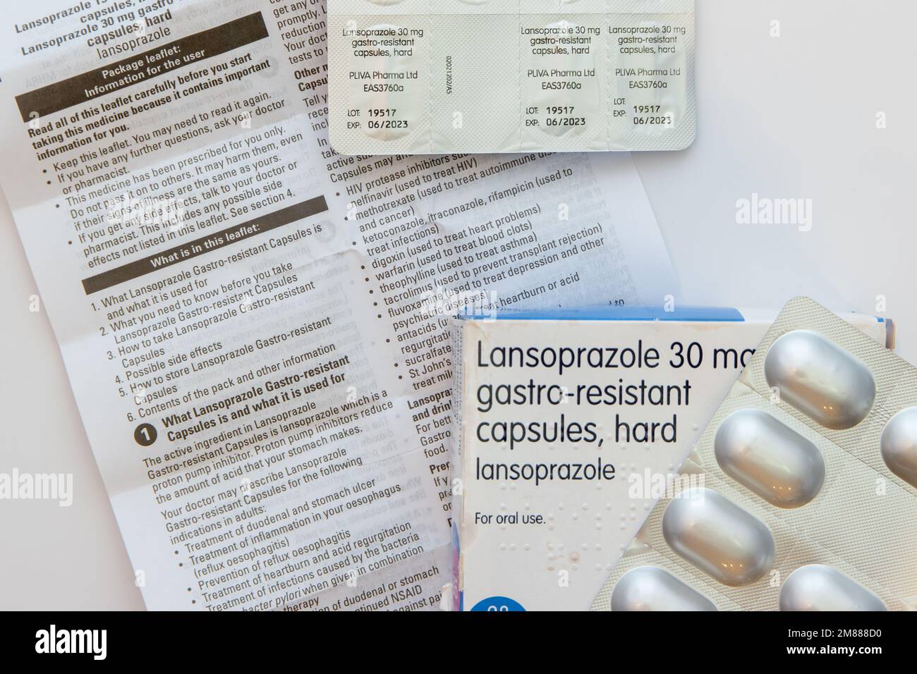 Box, information leaflet and blister pack of generic Pliva Teva 30mg Lansoprazole tablets / capsules Stock Photo