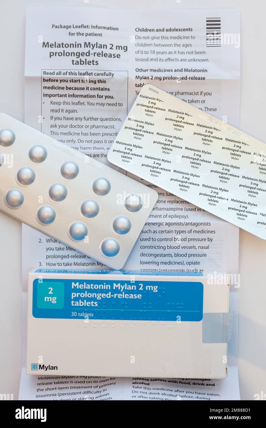 Box, information leaflet and blister pack of Melatonin Mylan 2mg prolonged-release tablets Stock Photo