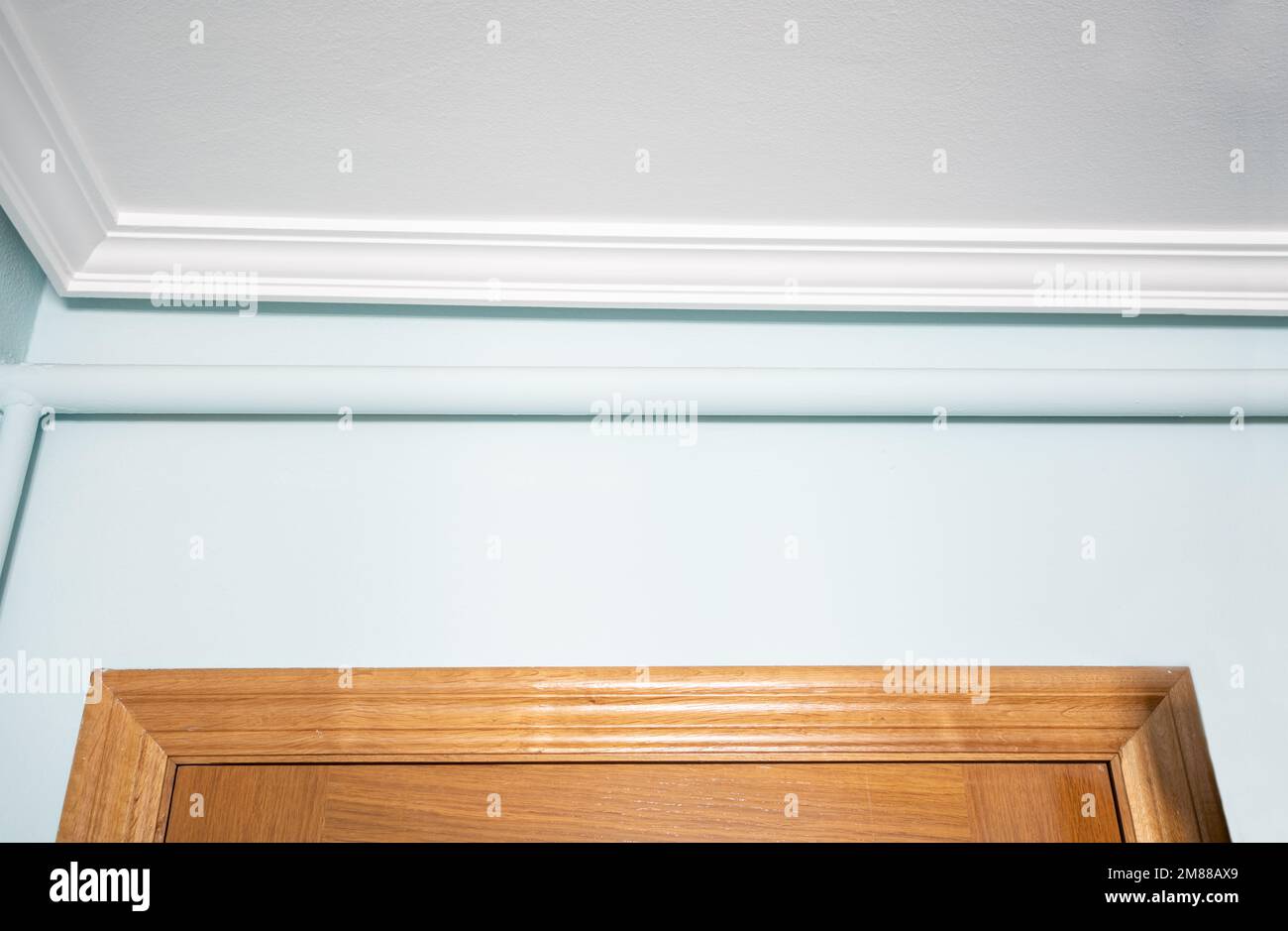 Old house with heating water pipe outside the wall inside a home Stock Photo Alamy