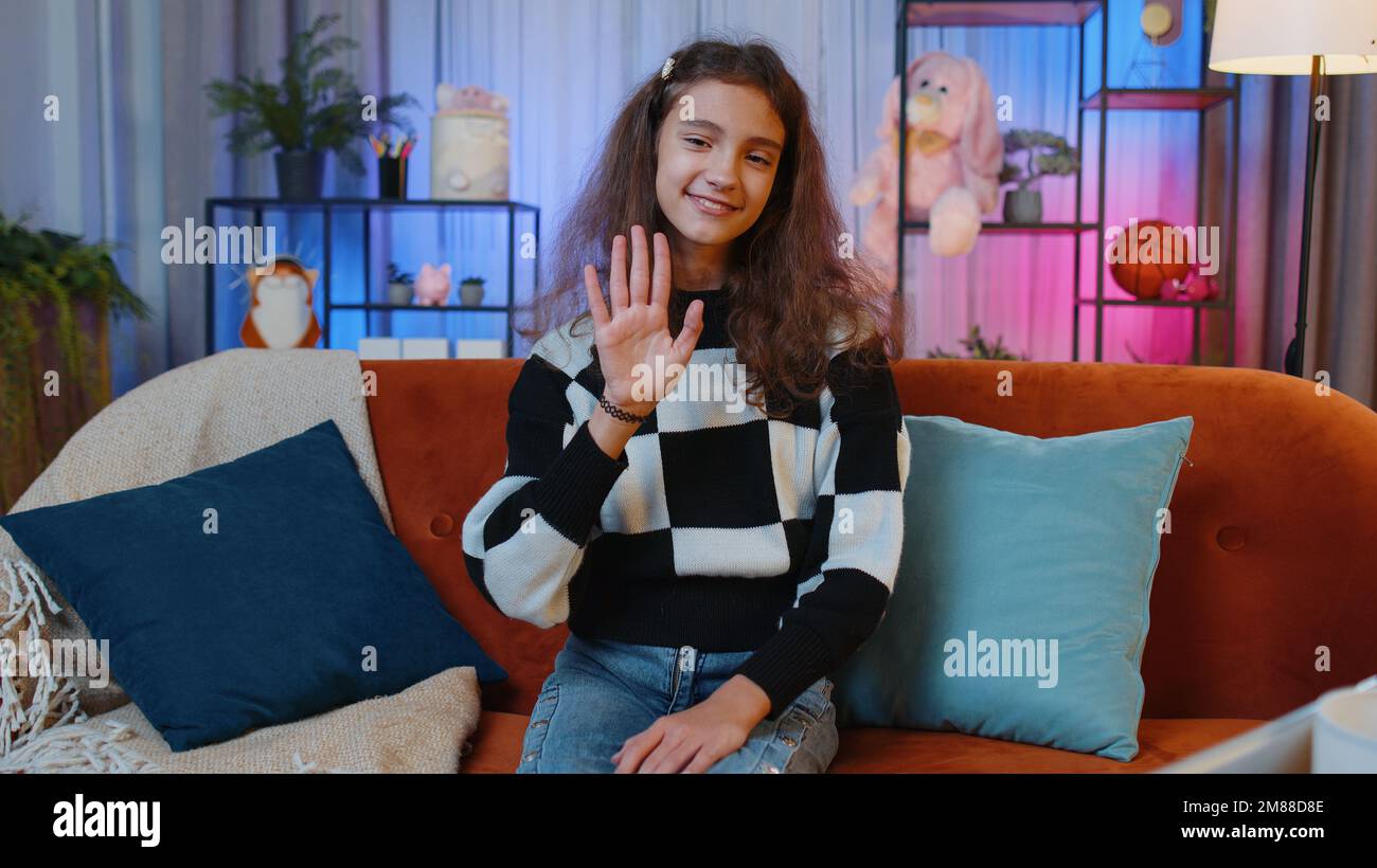 Preteen girl waving goodbye hi-res stock photography and images - Alamy