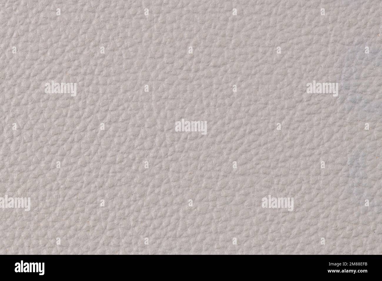 Closeup white leatherette texture for pattern background or wallpaper