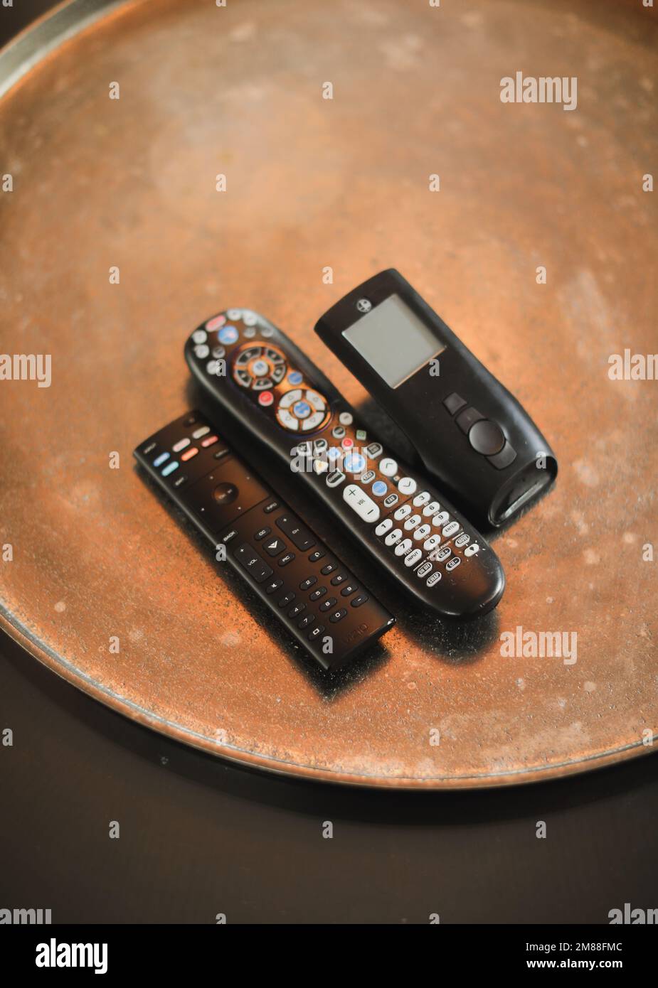 Remote control on table future technology Stock Photo - Alamy