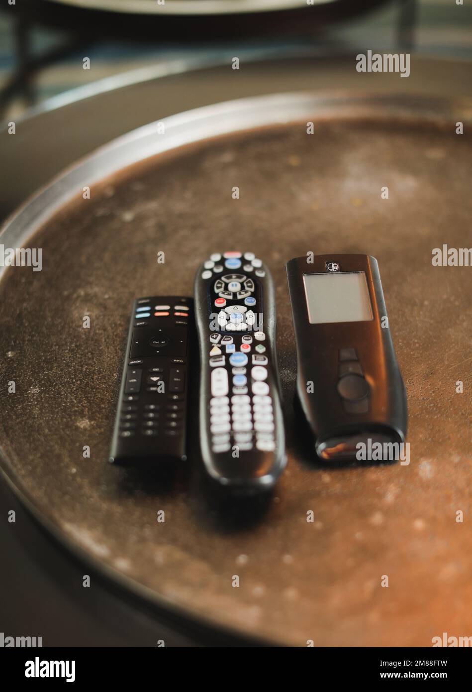 Remote control on table future technology Stock Photo - Alamy