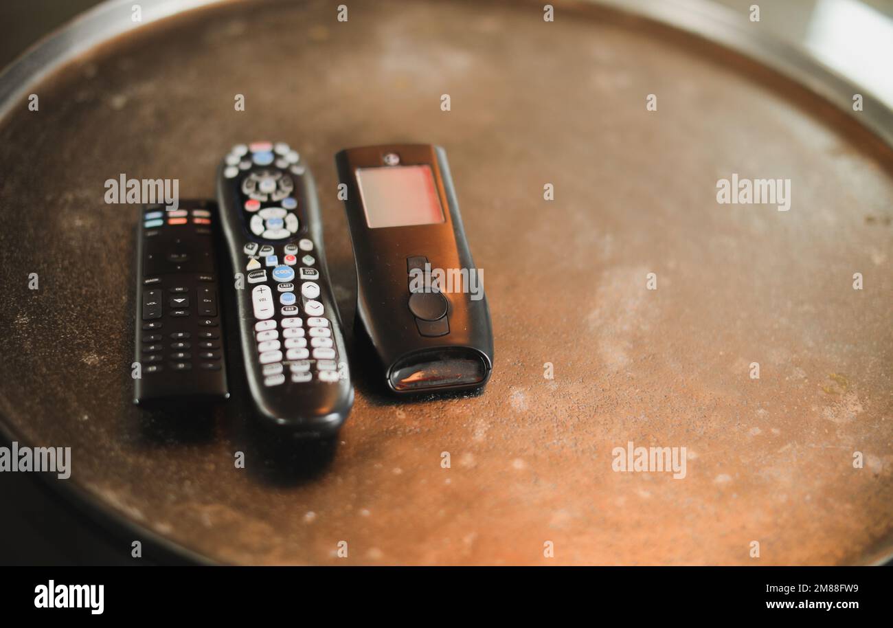 Remote control on table future technology Stock Photo - Alamy