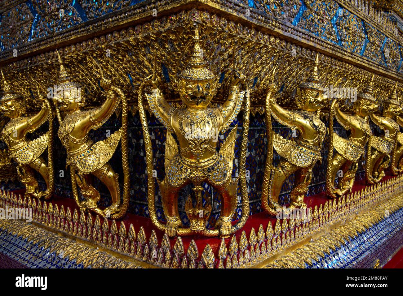 Garudas with Nagas, bird-like mythical creatures, Wat Phra Kaeo temple, old royal palace, Temple of the Emerald Buddha, Bangkok, Thailand, Asia Stock Photo