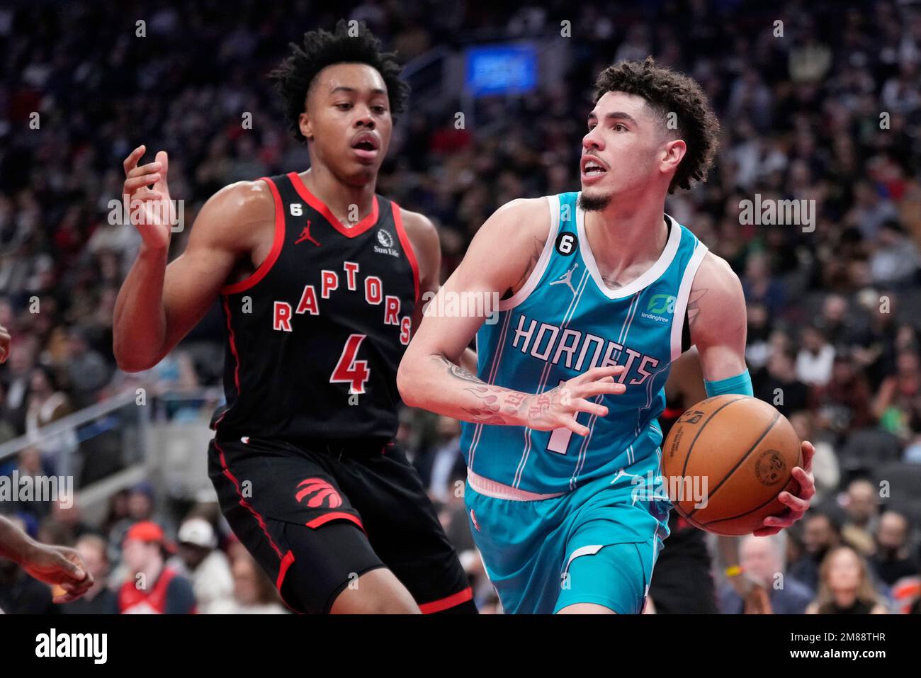 LaMelo Ball of the Charlotte Hornets looks on during the fourth