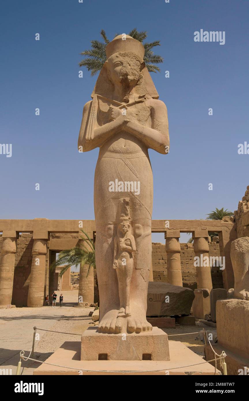 Statue of Ramses II with his daughter Meritamun, Karnak Temple, Karnak ...