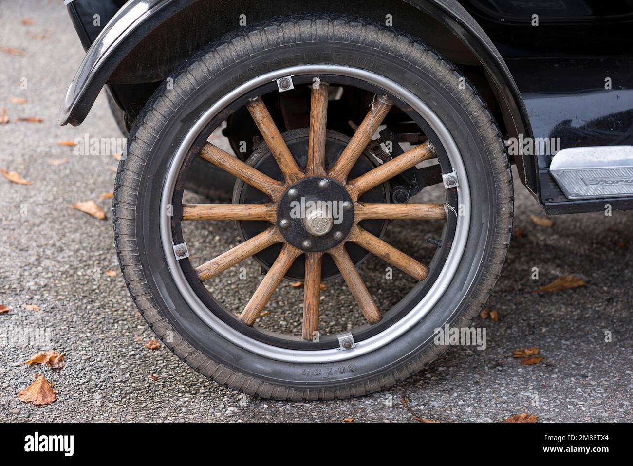 Wooden spoke wheel from a 1936 vintage Ford, Bavaria, Germany Stock Photo
