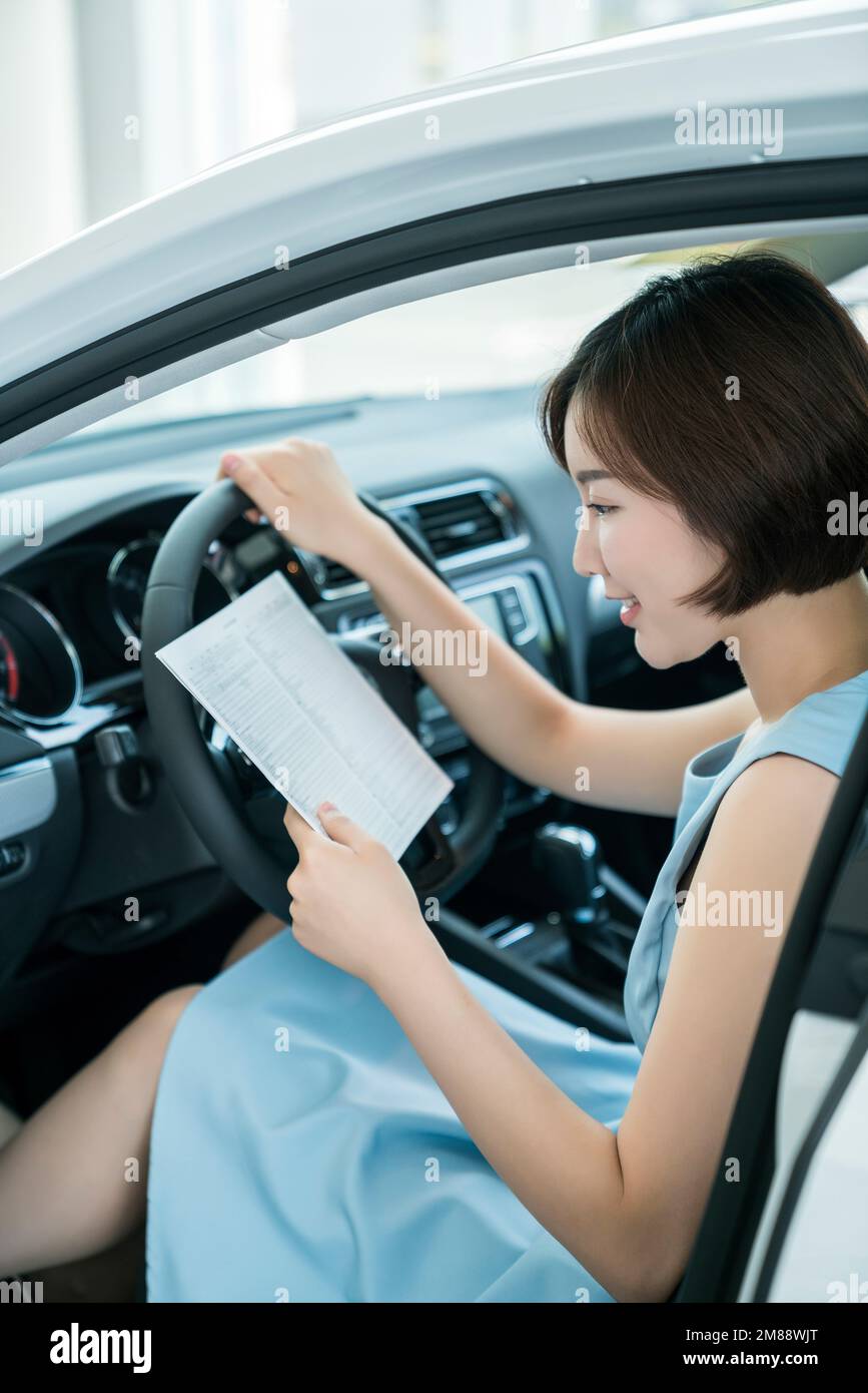 Young people in the car 4 s shop Stock Photo