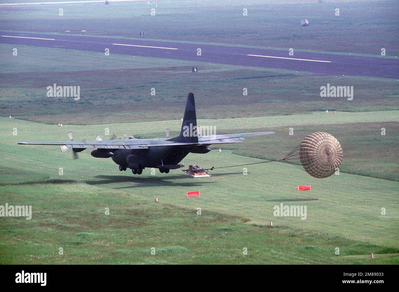 A 37th Tactical Airlift Squadron C130E Hercules aircraft delivers