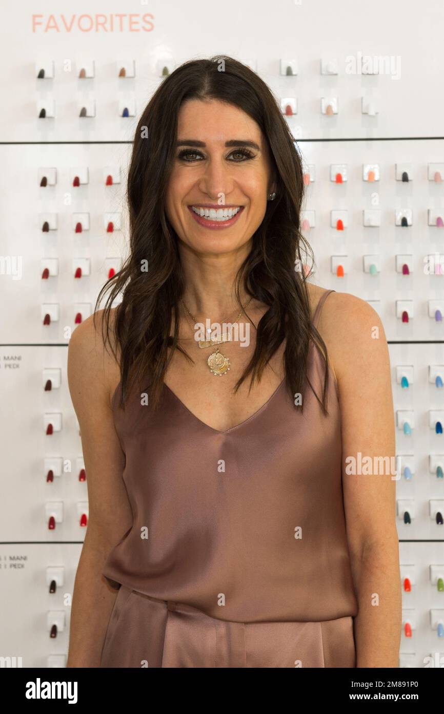 Founder/CEO of GLOSSLAB Rachel Apfel Glass attends the grand opening of