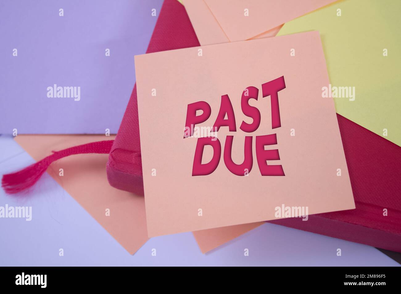Past Due. Text on adhesive note paper. Event, celebration reminder message. Stock Photo
