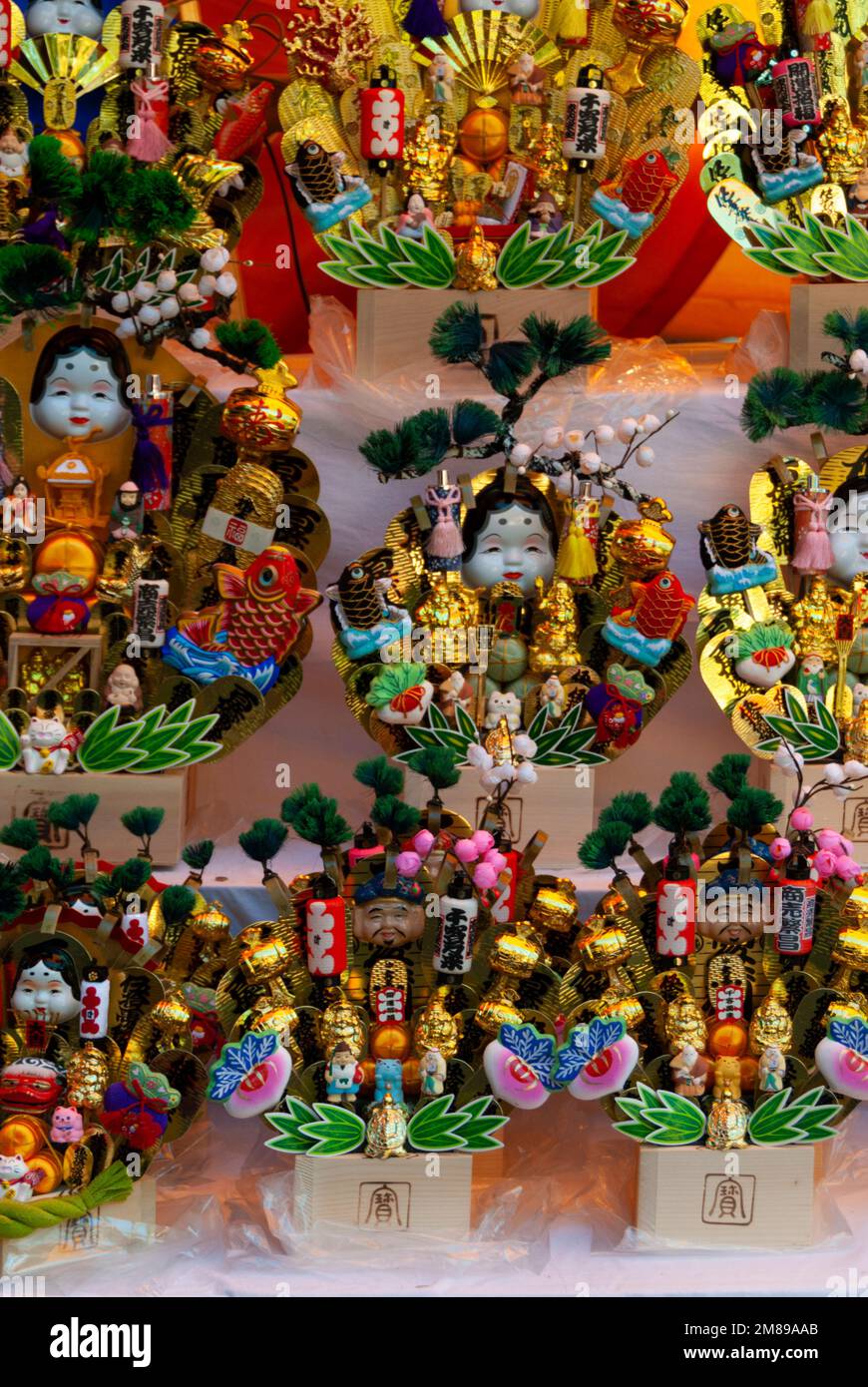 New Year’s decorations symbolising goog luck for sale at the Suwa