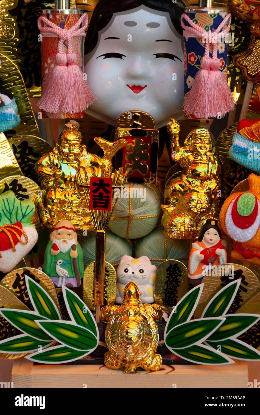 New Year’s decorations symbolising goog luck for sale at the Suwa