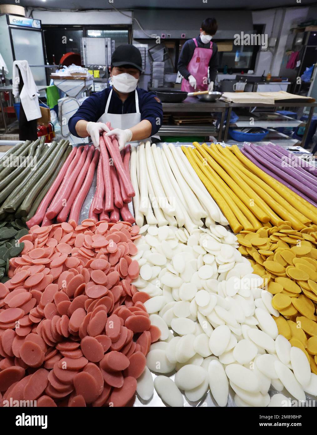 Making Korean rice cake ahead of holiday A shopkeeper makes "garaetteok