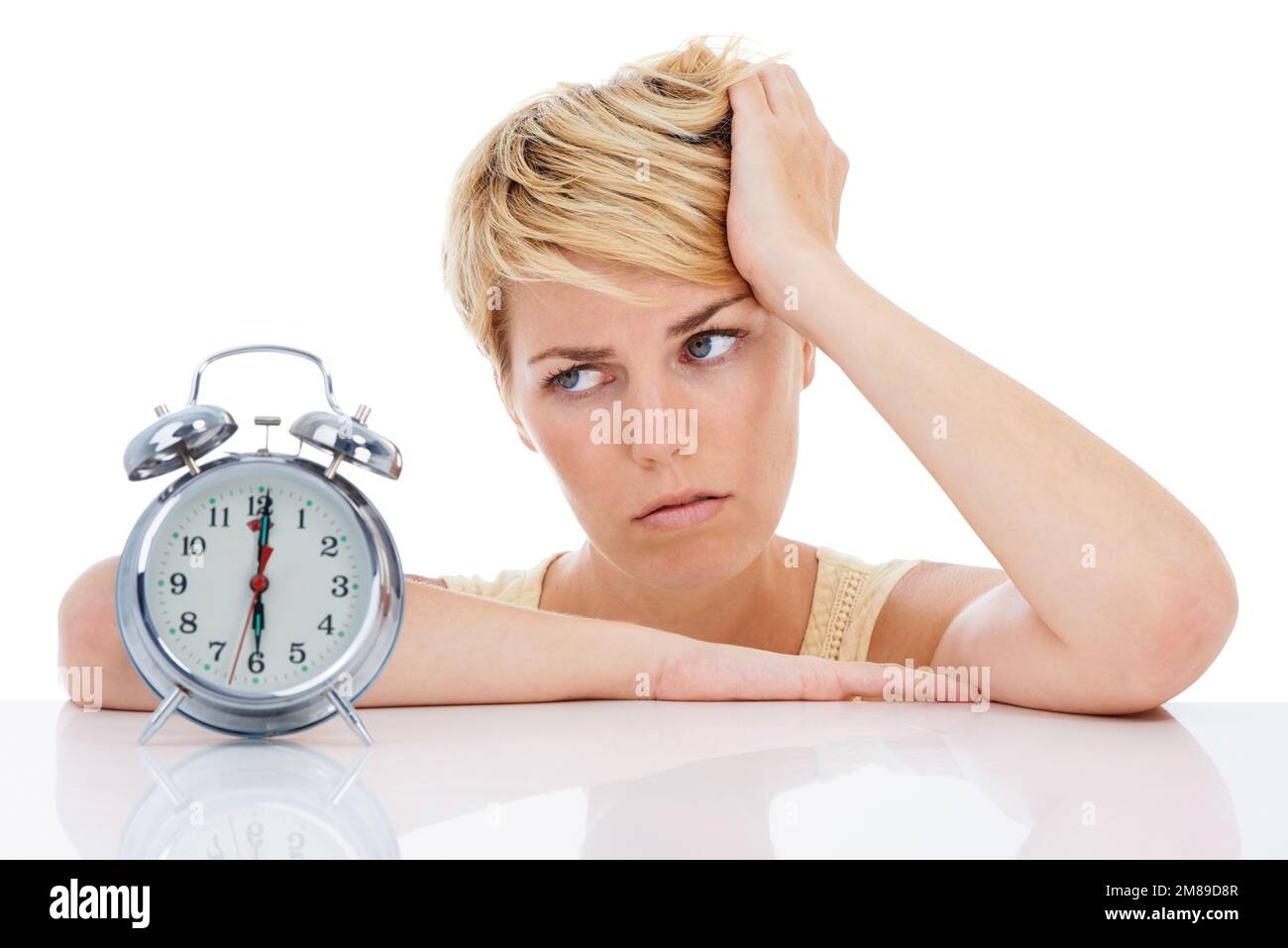 Do I really have to get up. An exhausted young woman staring at her