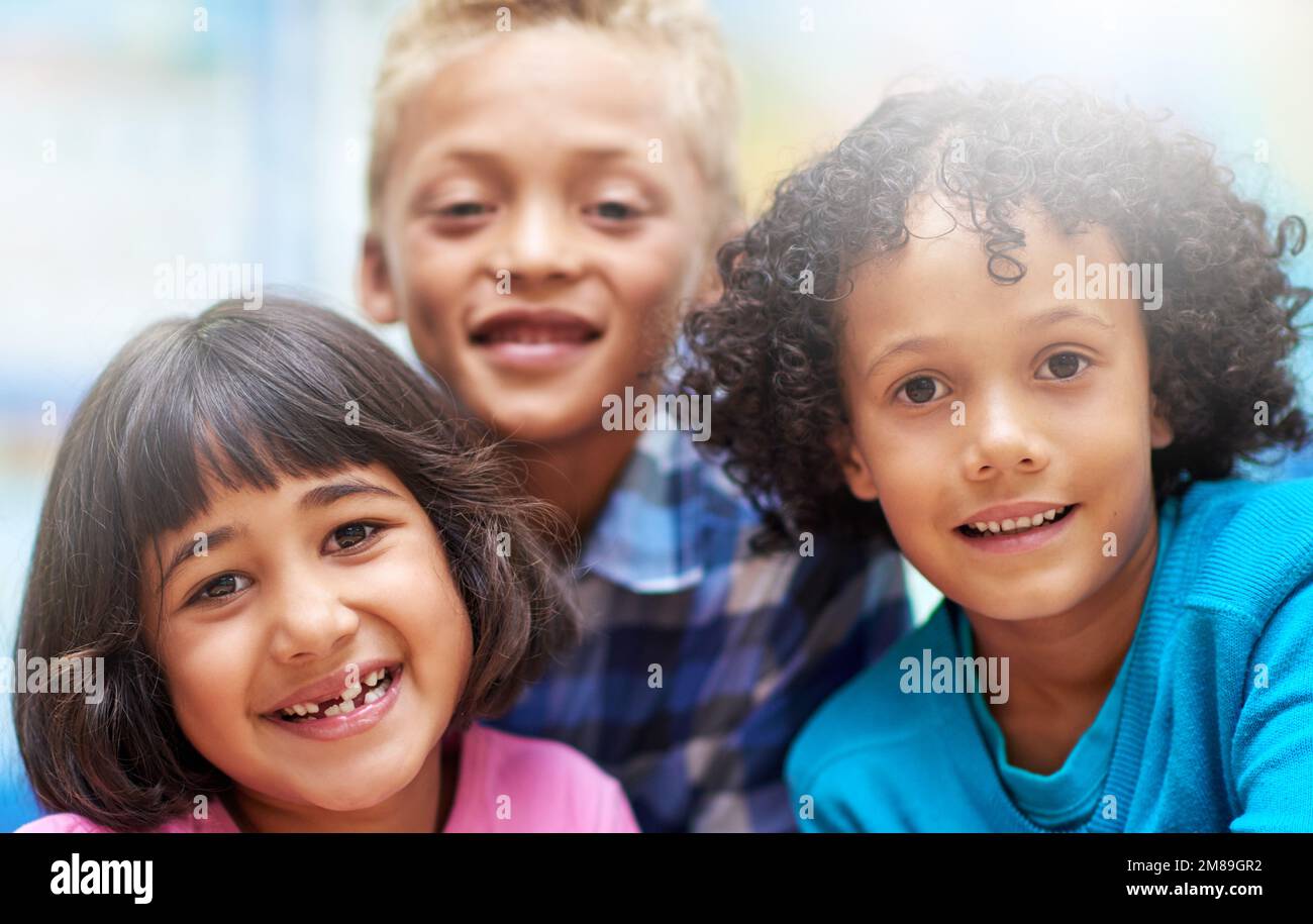 The faces of our future. Portrait of elementary kids at school. Stock Photo