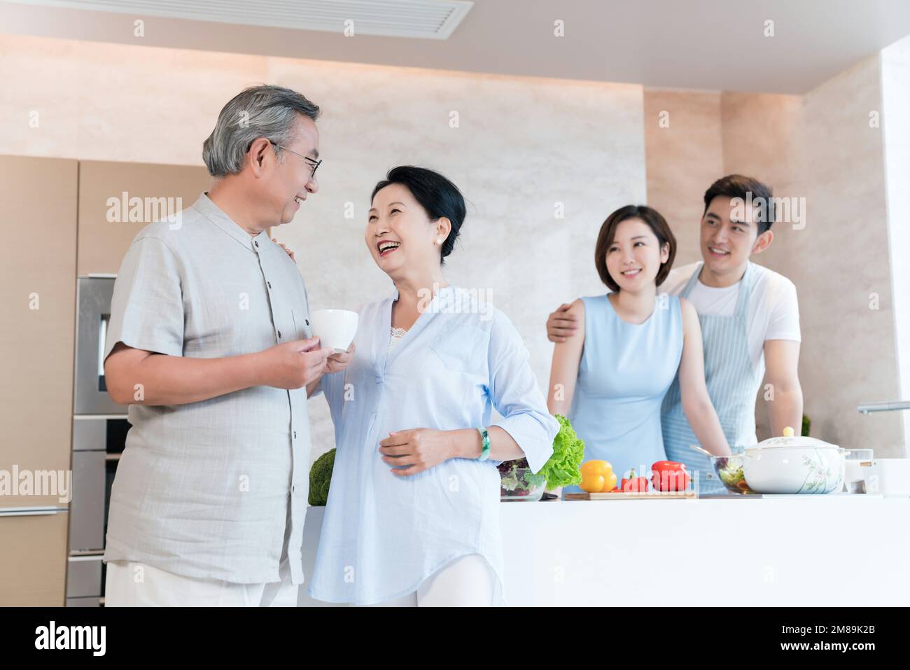 Happy family in the kitchen Stock Photo