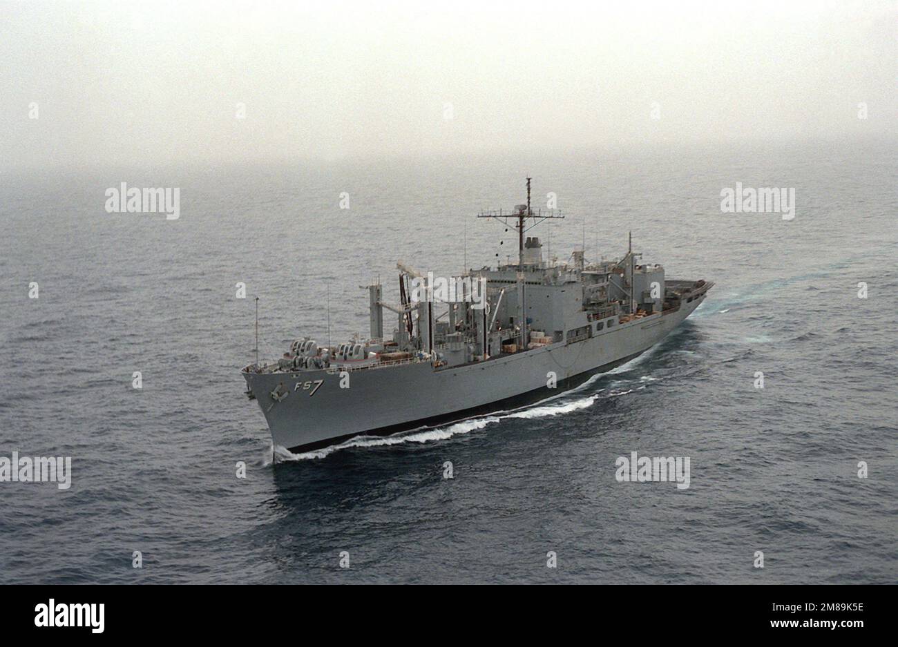 A port bow view of the combat stores ship USS SAN JOSE (AFS-7) underway. Country: Unknown Stock Photo