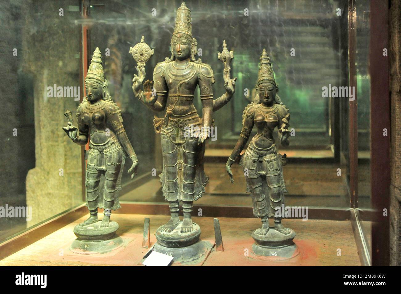 Sculpture of a Hindu God Vishnu and two goddess in bronze Chola dynasty