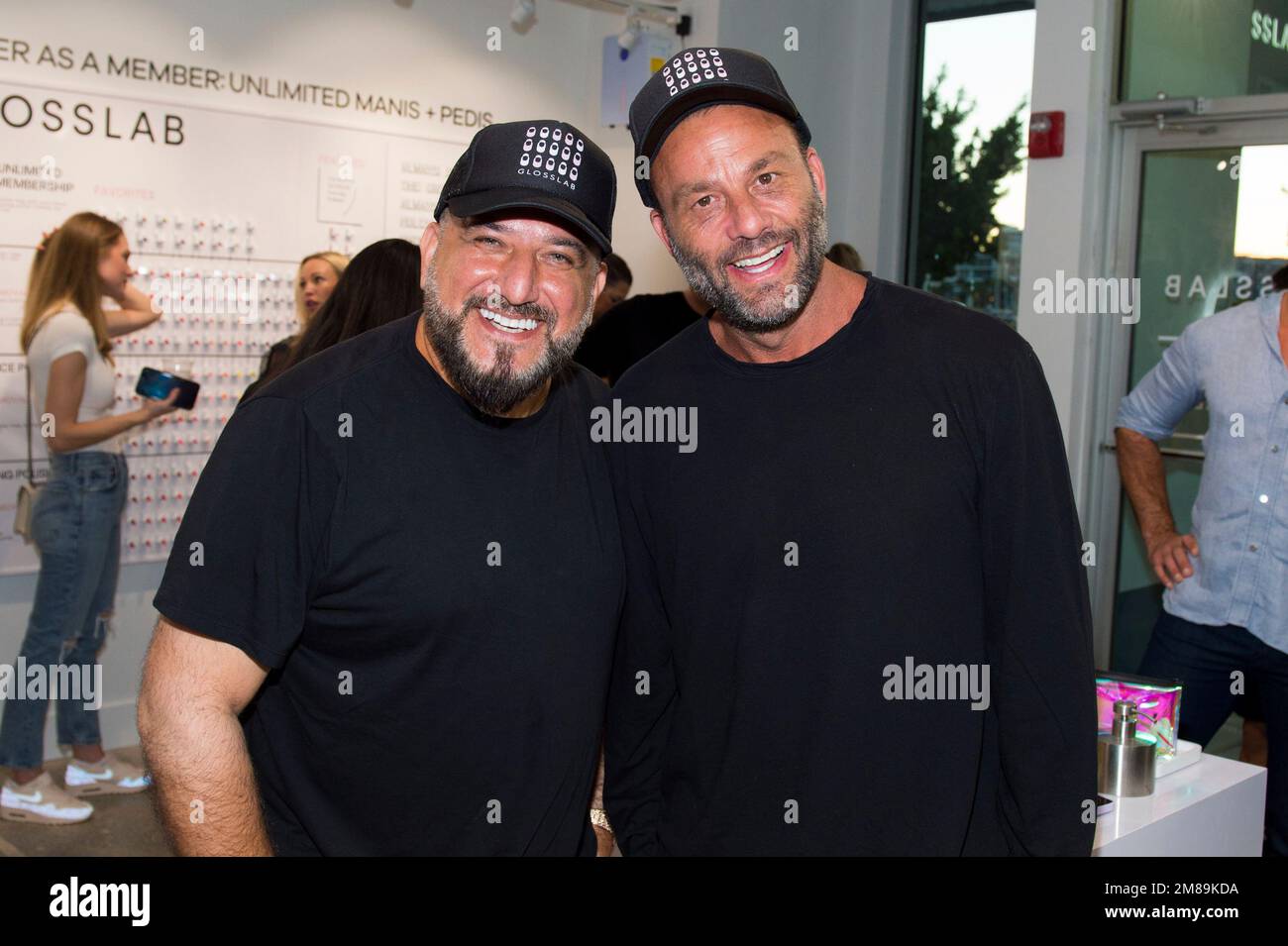 David "Papi" Einhorn, left, and Dave Grutman attend the grand opening