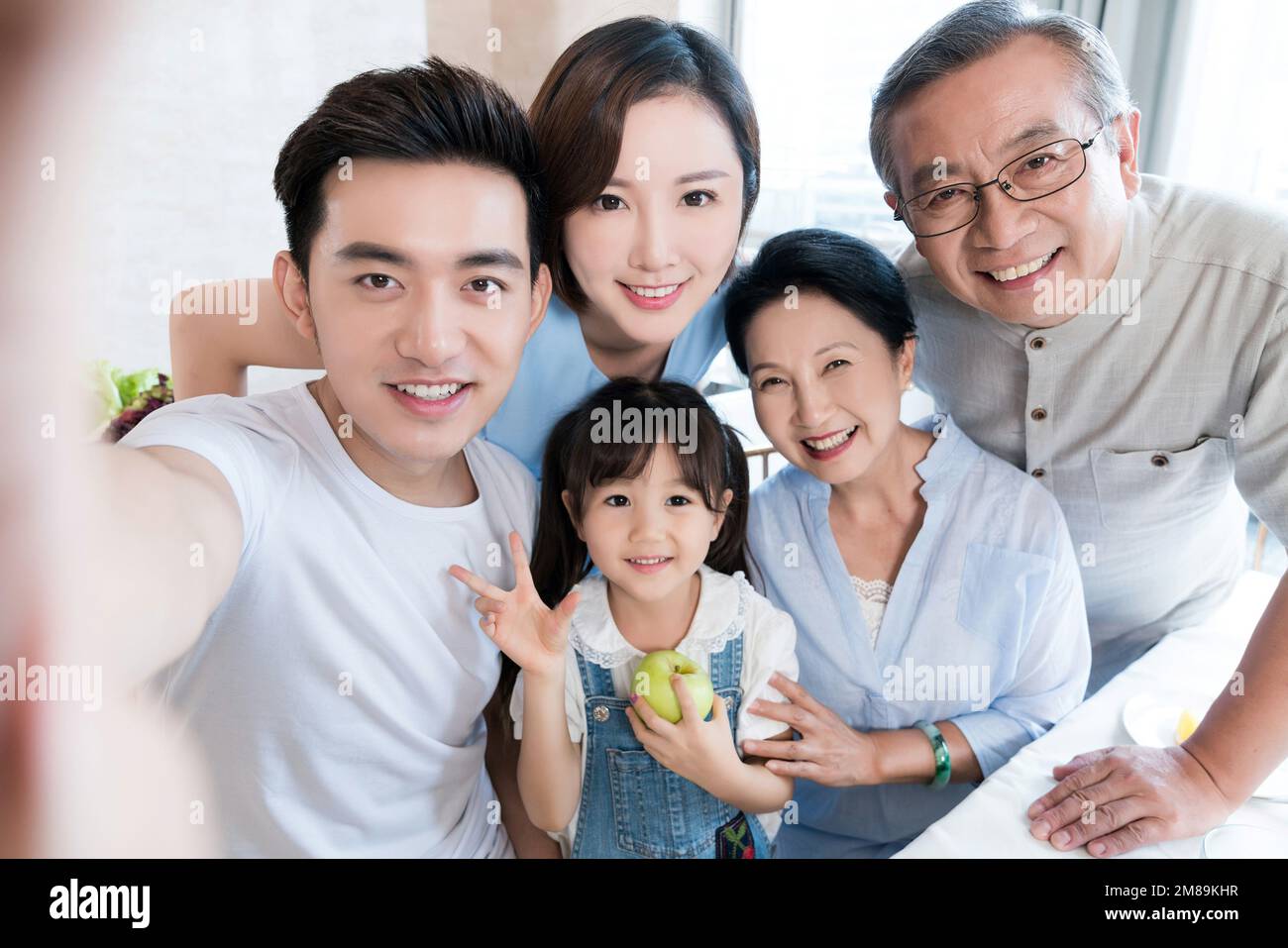 Happy family meals Stock Photo - Alamy