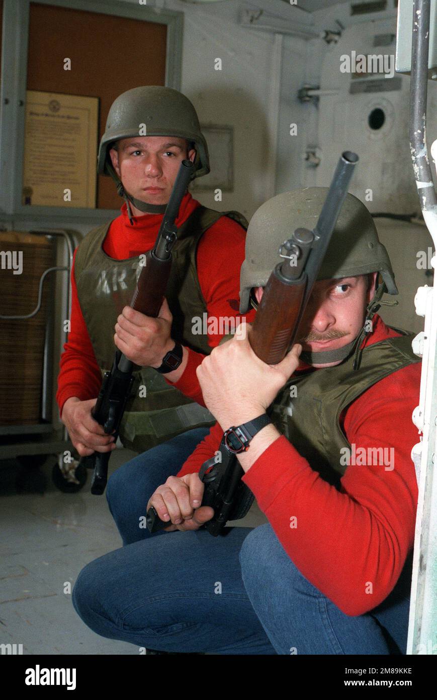 Members of the weapons division Armed Response Team, armed with Mossberg 500 series 12gauge