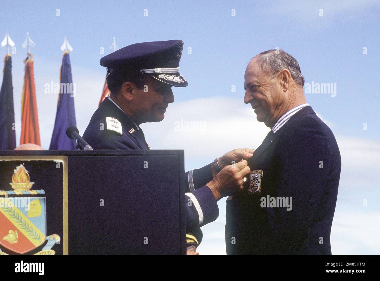 Robert L. Hite, one of Doolittle's Raiders, receives his POW/MIA medal for service in World War II from Major General Alexander K. Davidson, commander, 22nd Air Force, Military Airlift Command. Base: Nav Post Grad School, Monterey State: California (CA) Country: United States Of America (USA) Stock Photo