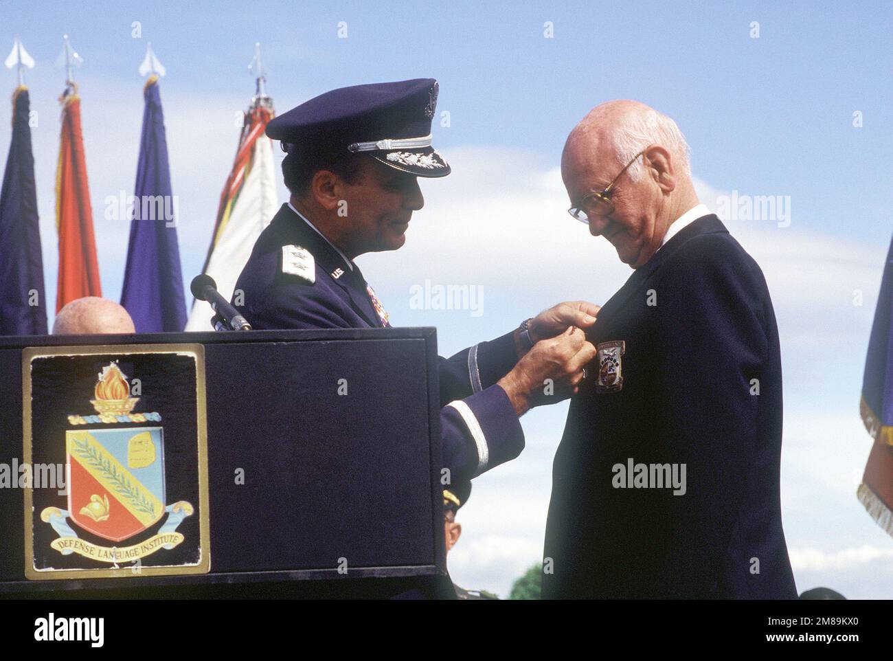 Thomas C. Griffin, one of Doolittle's Raiders, receives his POW/MIA medal for service in World War II from Major General Alexander K. Davidson, commander, 22nd Air Force, Military Airlift Command. Base: Nav Post Grad School, Monterey State: California (CA) Country: United States Of America (USA) Stock Photo