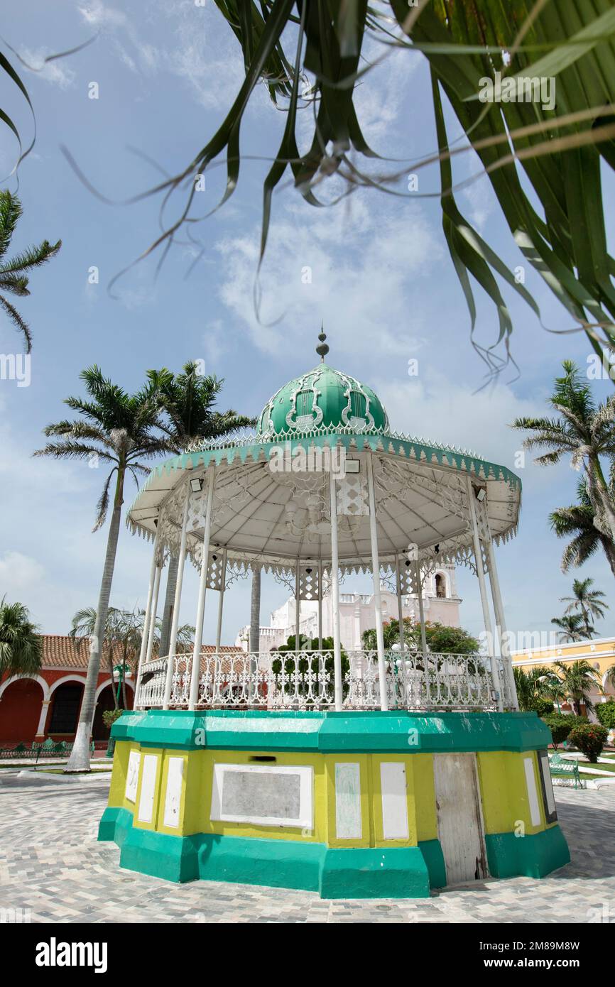 Palm framed view of a central plaza in Tlacotalpan, Veracruz, Mexico. Stock Photo