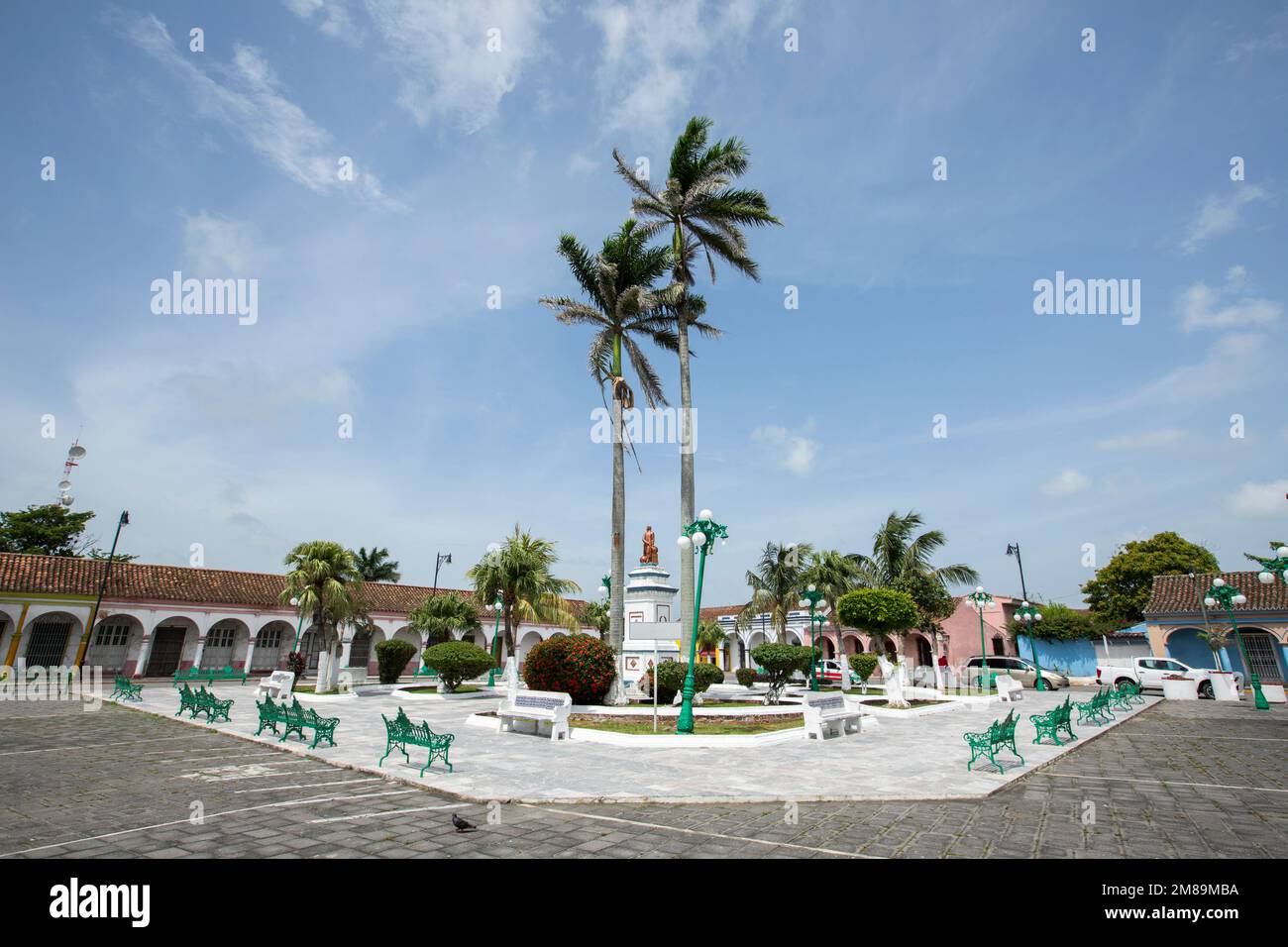 Palm framed view of a central plaza in Tlacotalpan, Veracruz, Mexico. Stock Photo