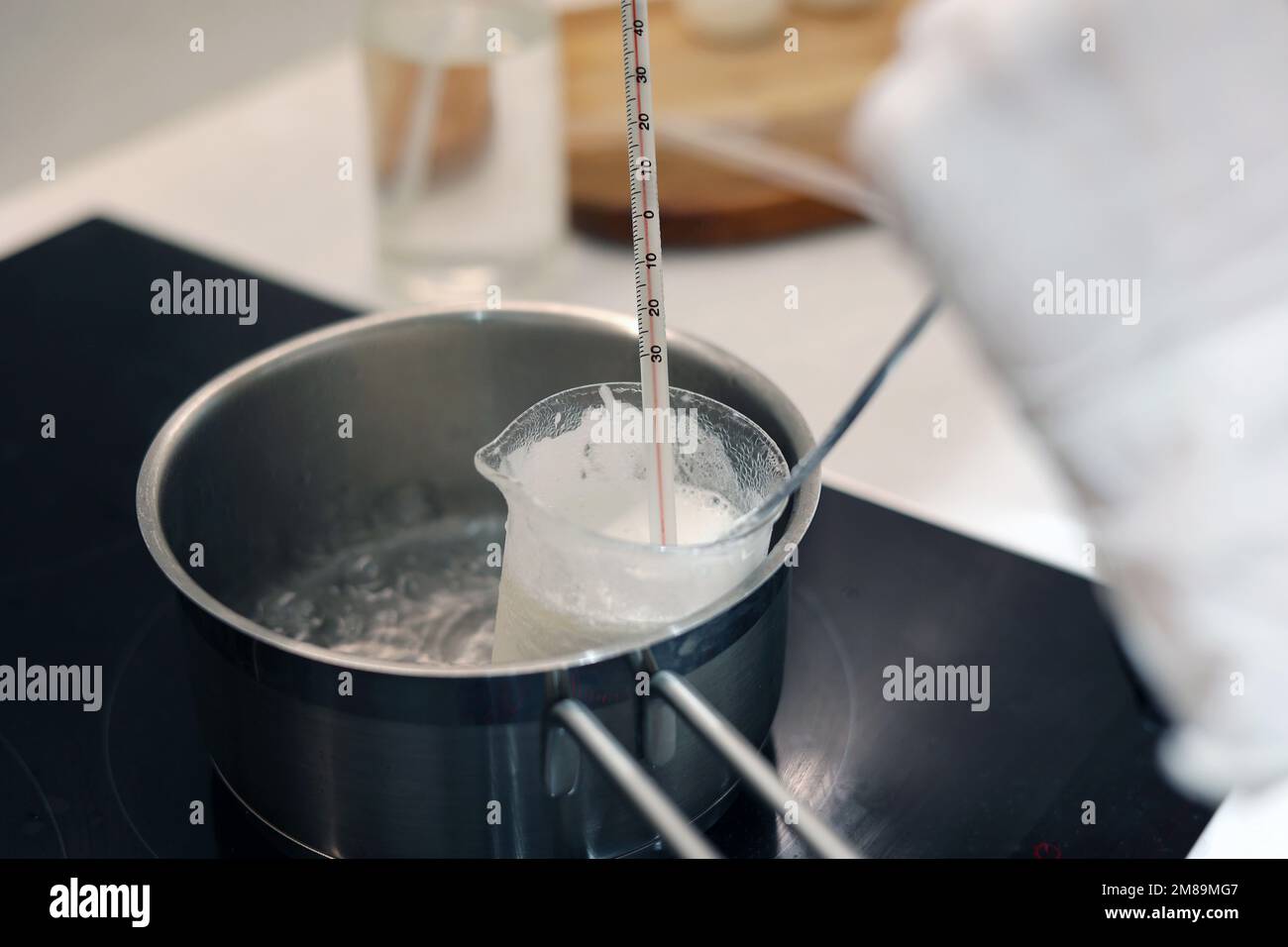 https://c8.alamy.com/comp/2M89MG7/heat-beaker-of-water-and-jojoba-oil-in-boiling-water-record-the-temperature-with-a-thermometer-2M89MG7.jpg