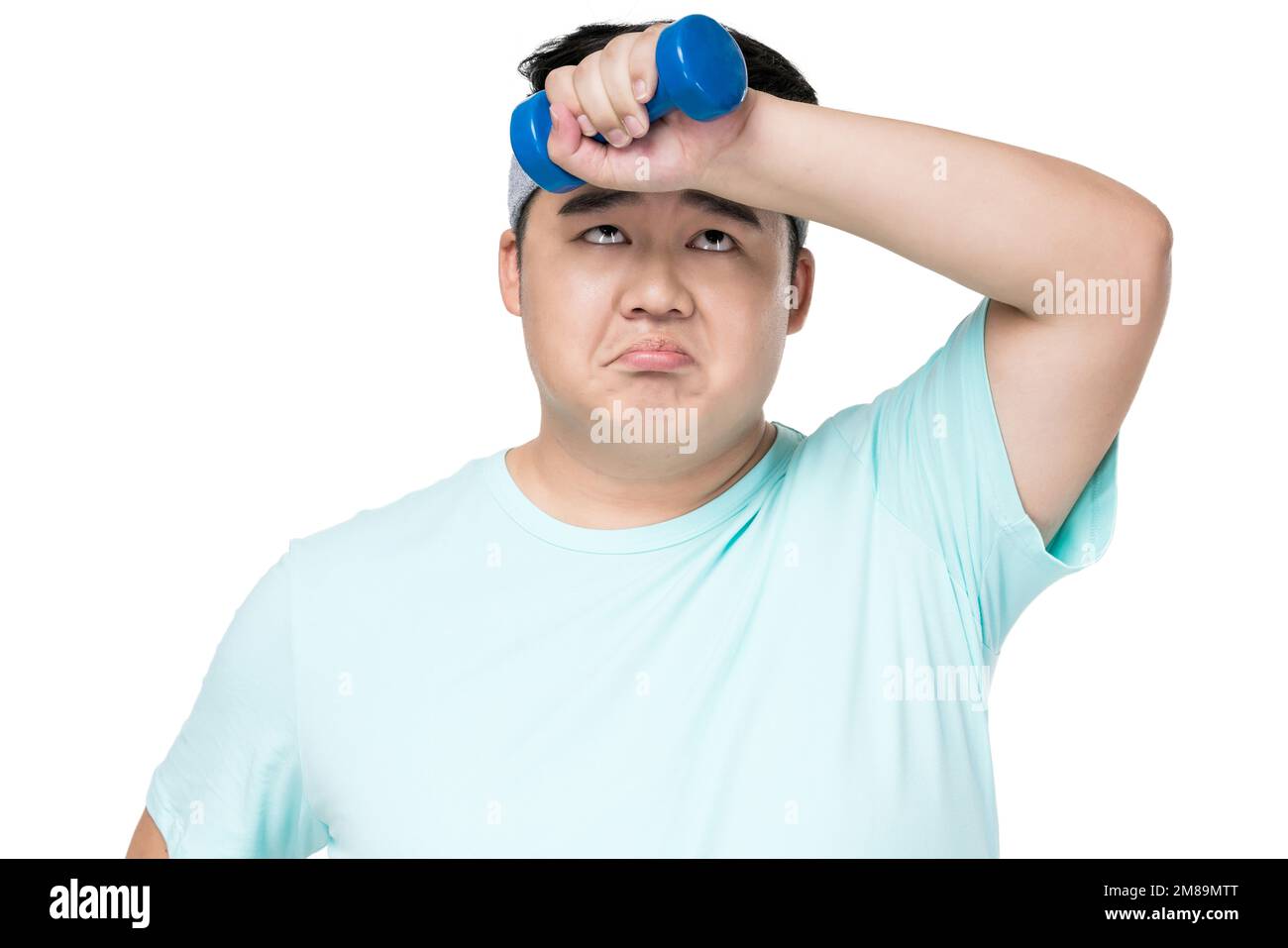 Fat young men in doing sports Stock Photo