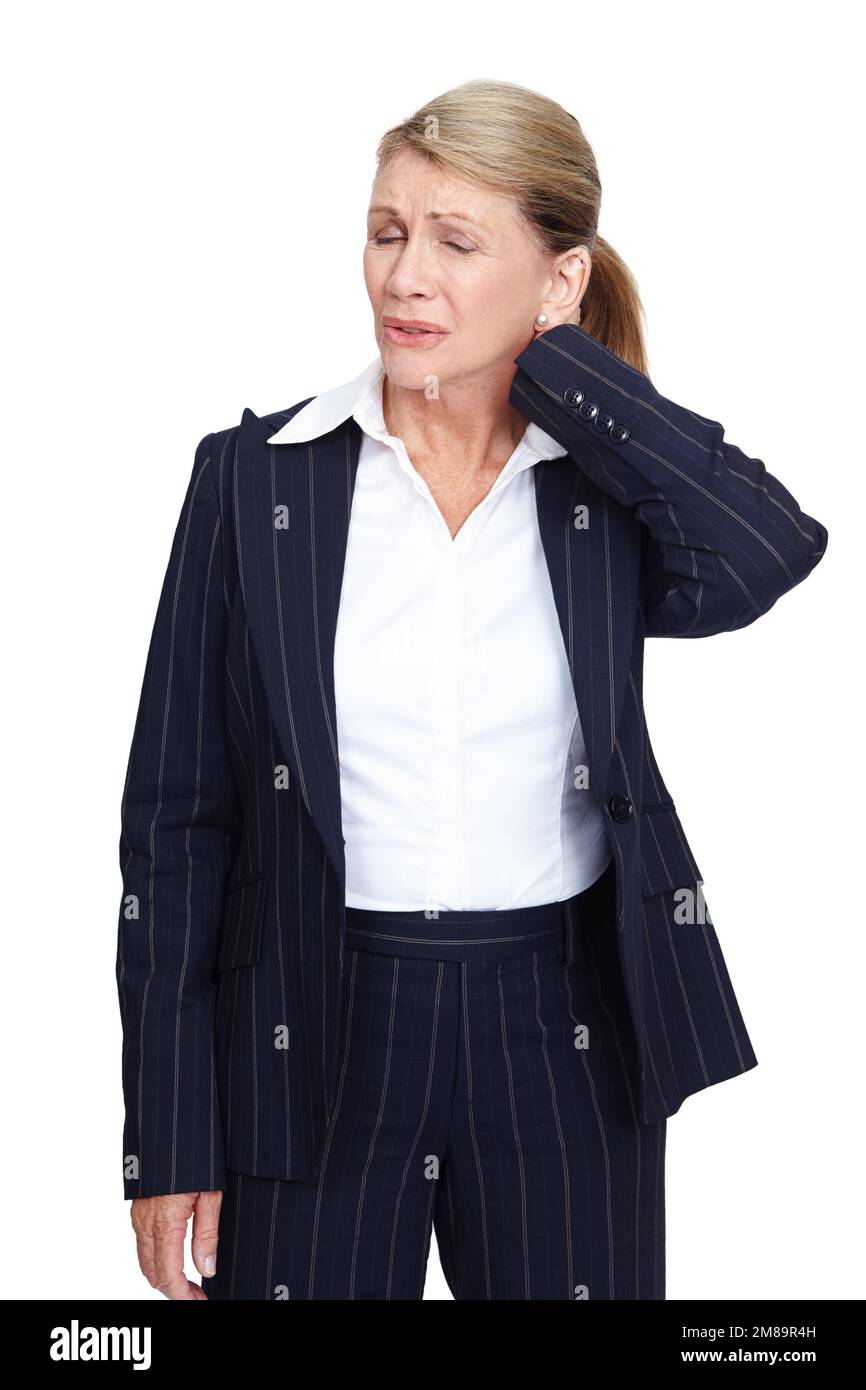 Mature woman executive, neck pain and studio with muscle injury, sprain and burnout by white background. Isolated senior model, injured and corporate Stock Photo