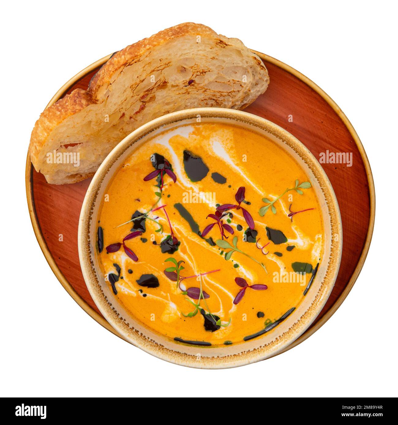 Portion of lentil soup with toasted bread Stock Photo