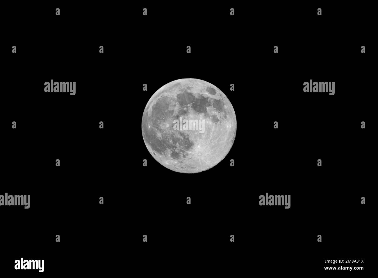 Full moon isolated on black night sky background Stock Photo