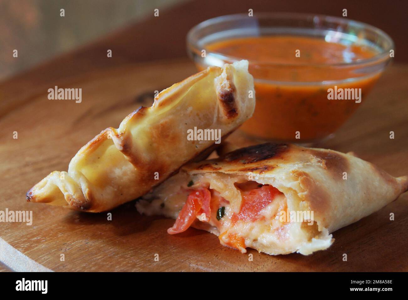 Argentine empanada stuffed mozzarella and tomato Stock Photo Alamy