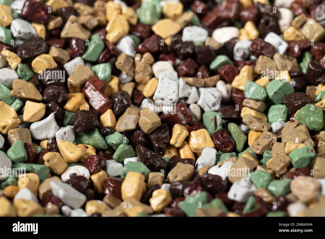 Heap shaped pebble chocolate. Stoneshaped chocolate with a sugar coating on the outside and a