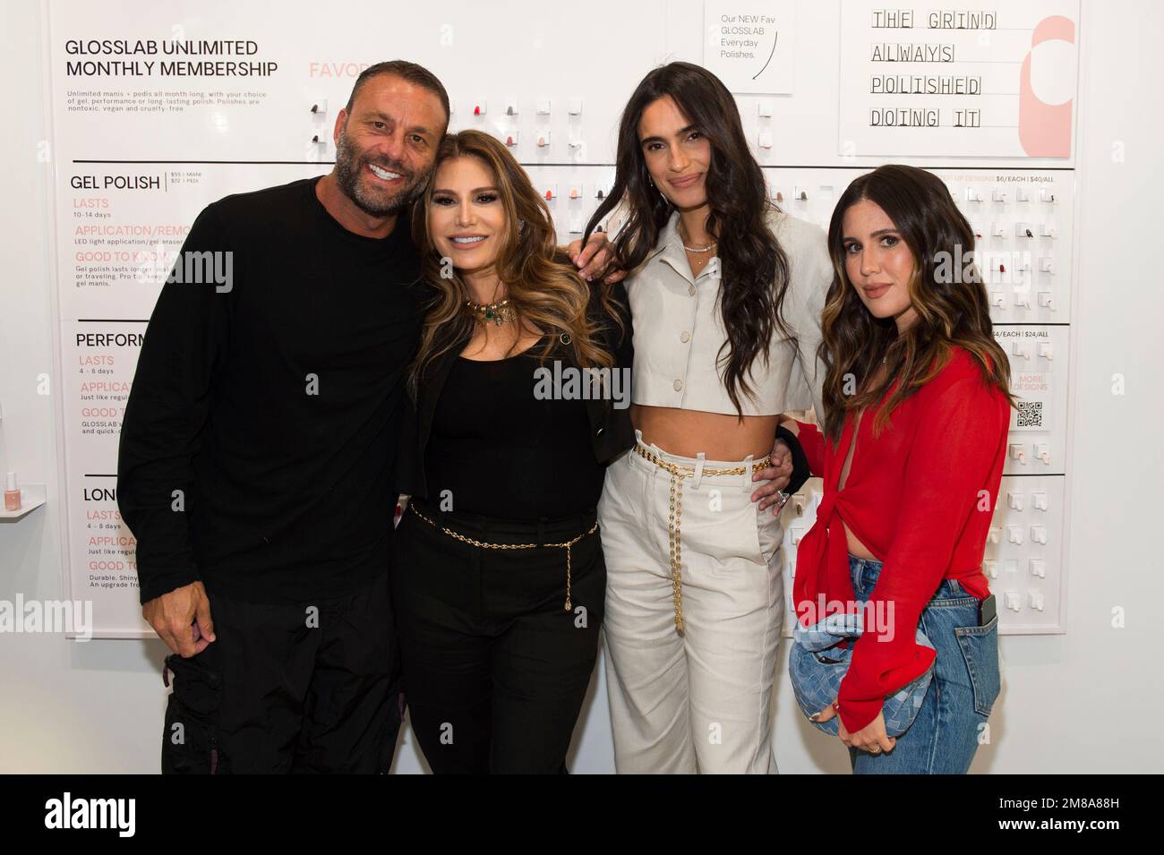 Dave Grutman, from left, Loren Ridinger, Isabela Rangel Grutman, and