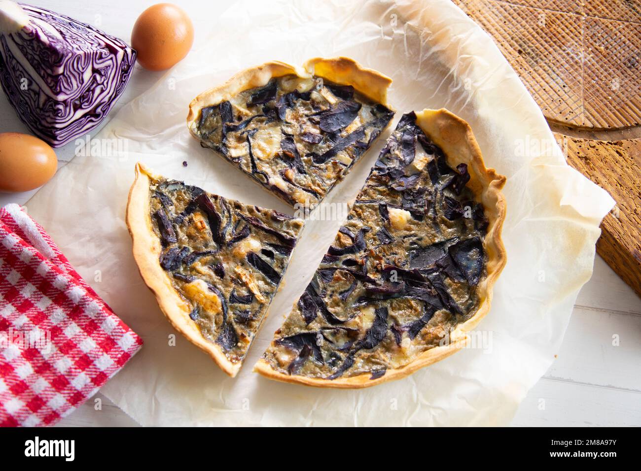 Red cabbage French quiche. In gastronomy, a quiche is a type of savory