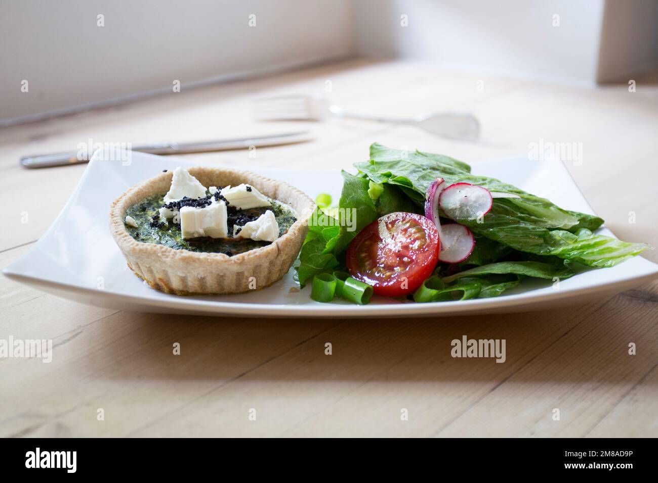 Spinach cheese French quiche. In gastronomy, a quiche is a type of