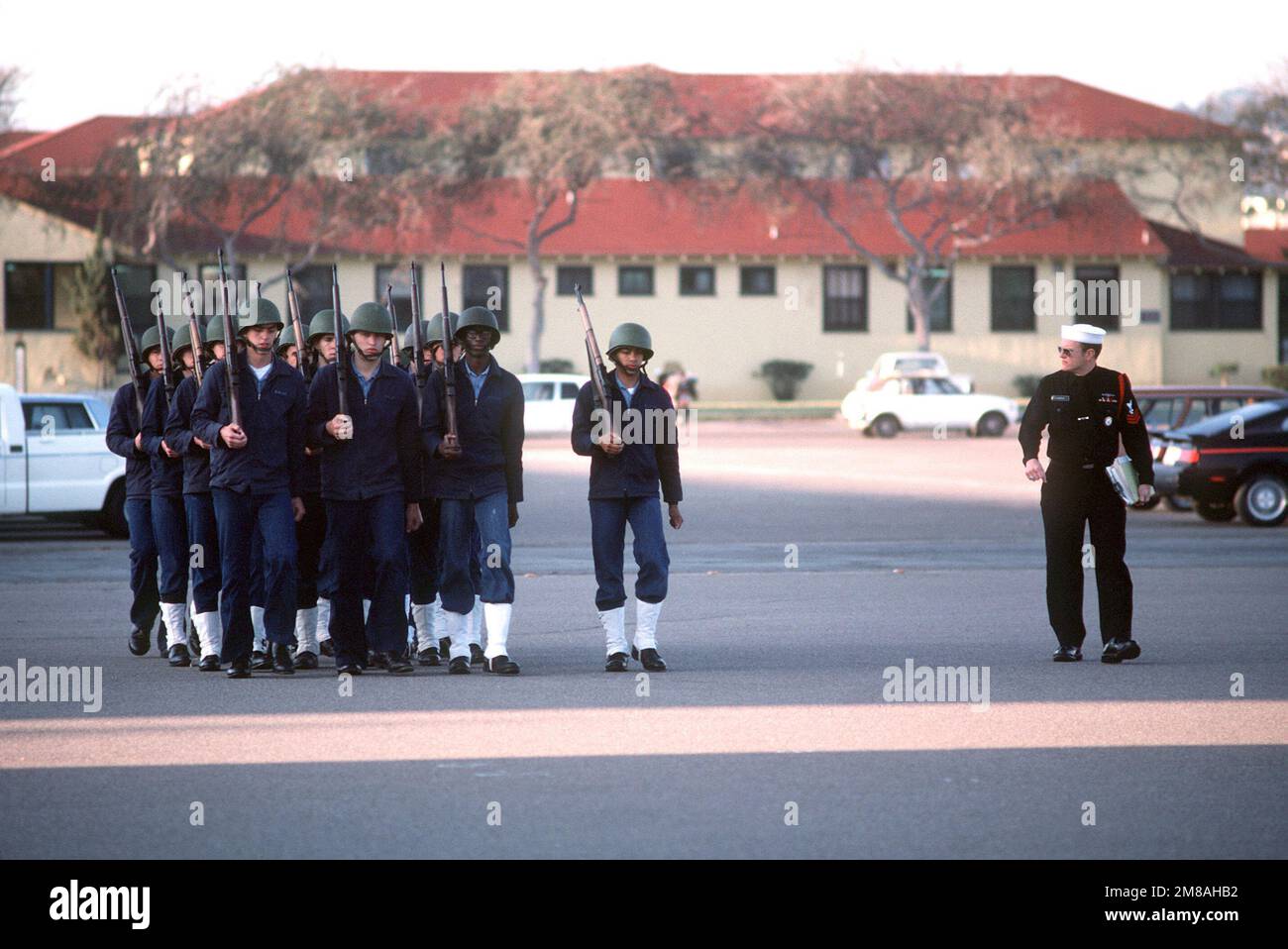 U.S. Navy recruits participate in a drill at the Naval Recruit Training ...
