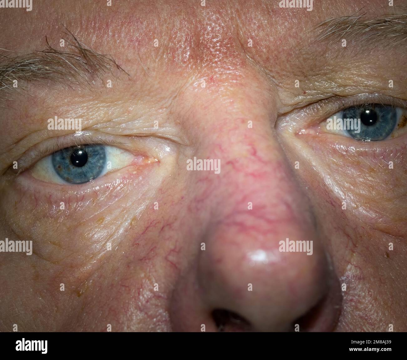 Old man with blue eyes from Sweden in closeup pic Stock Photo