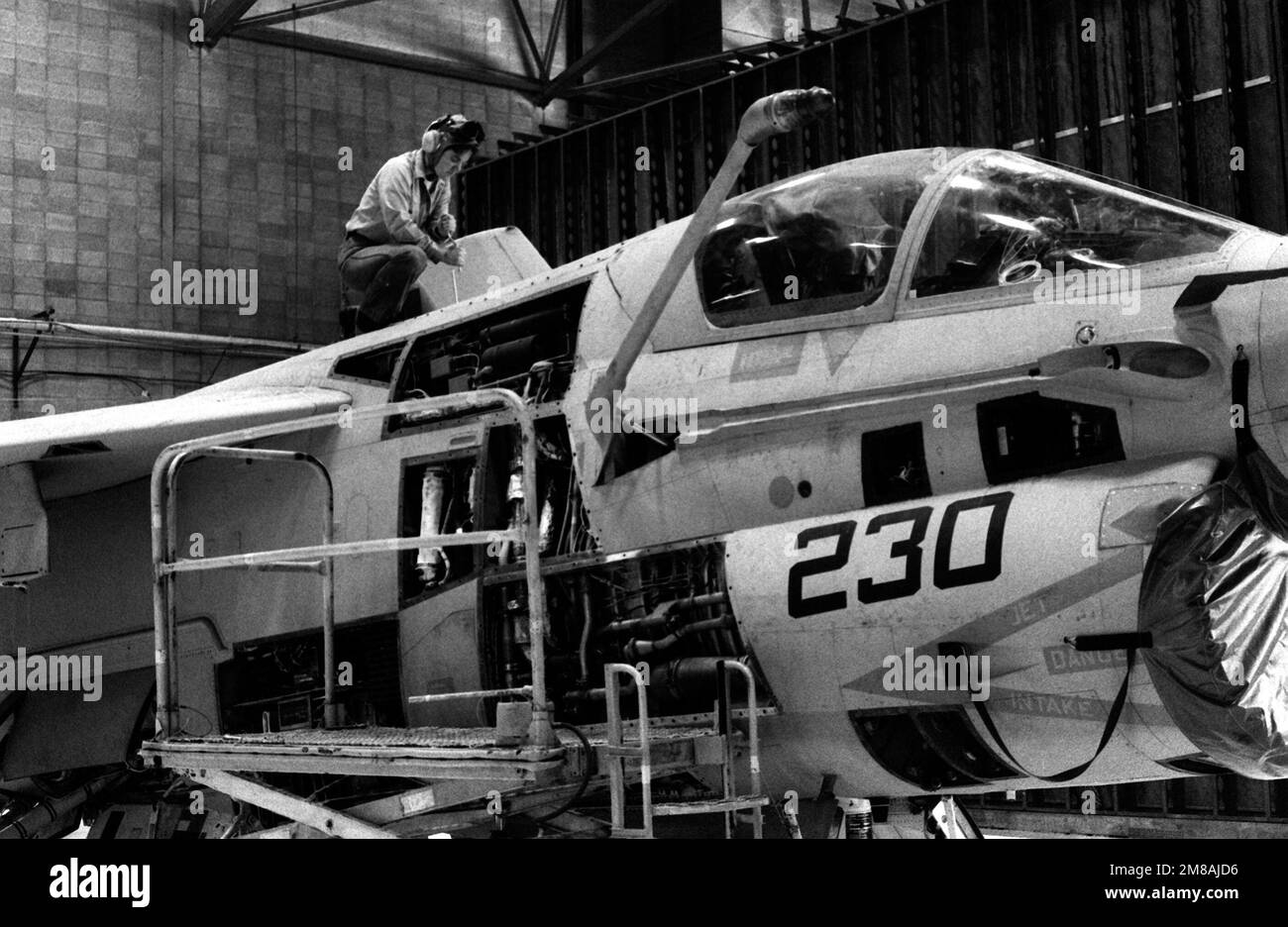 Aviation Structural Mechanic H AIRMAN Lynne Courtney works on a