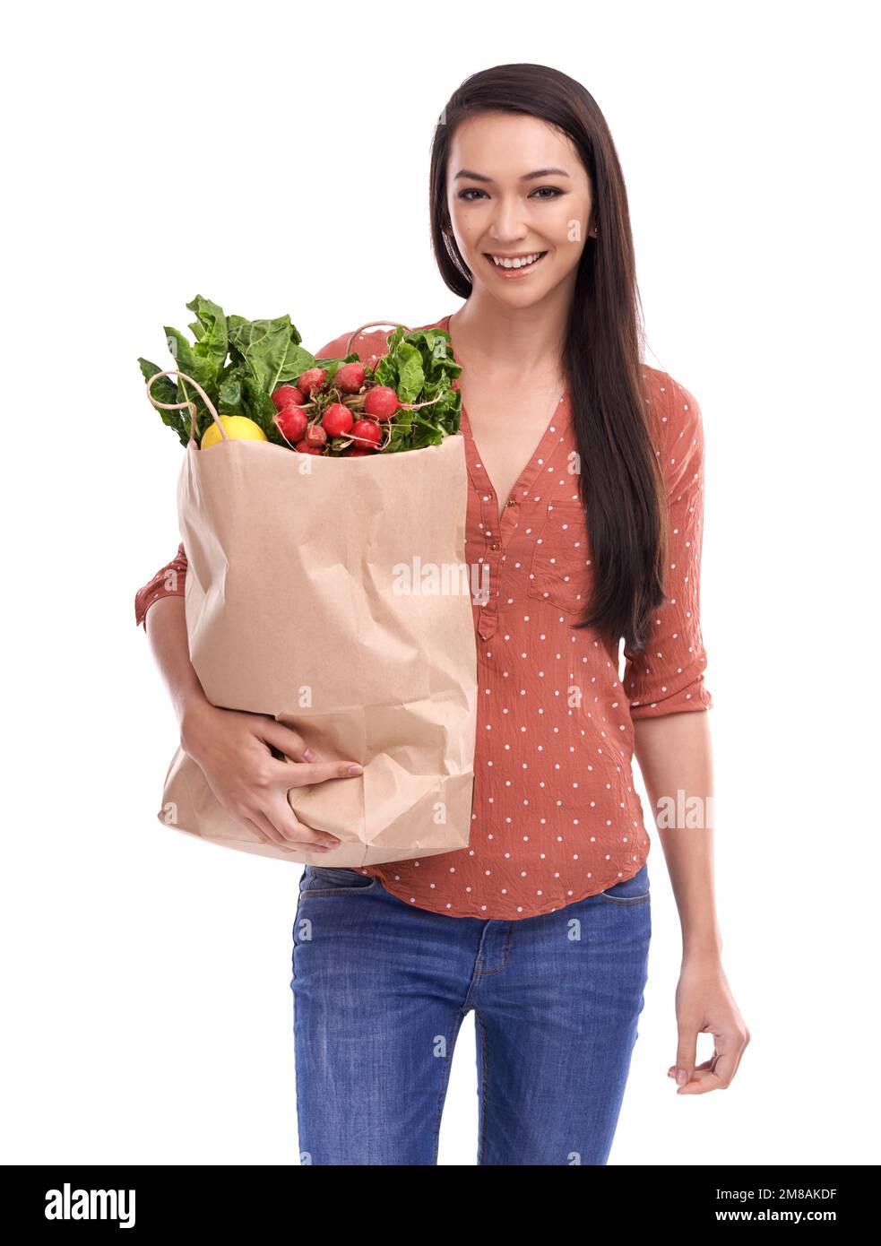 Woman, happy portrait and healthy food or grocery shopping bag in white background for nutrition health, vegetables diet and happiness isolated in Stock Photo