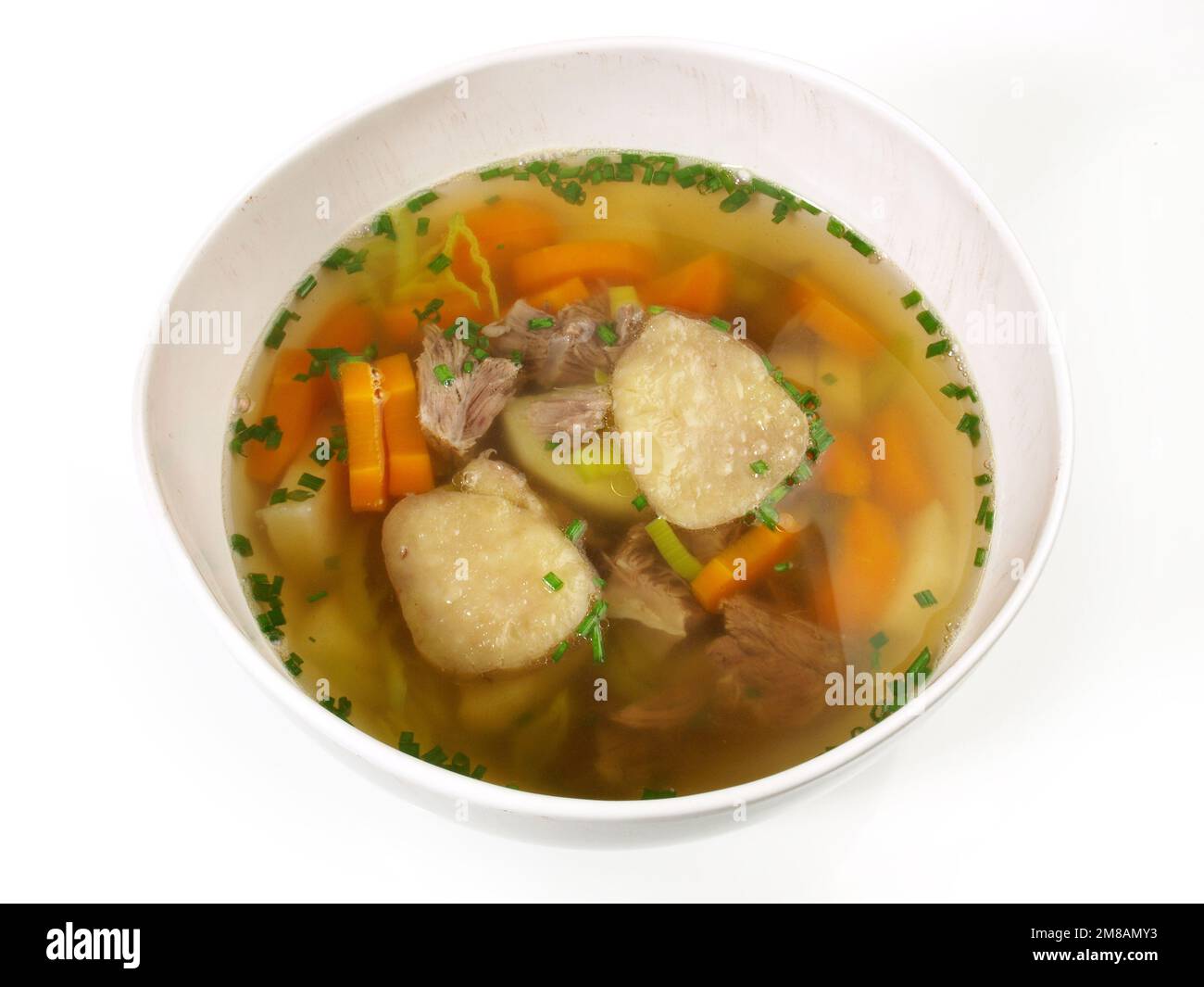 Beef Bone Marrow Soup with Vegetables and Spice isolated on white