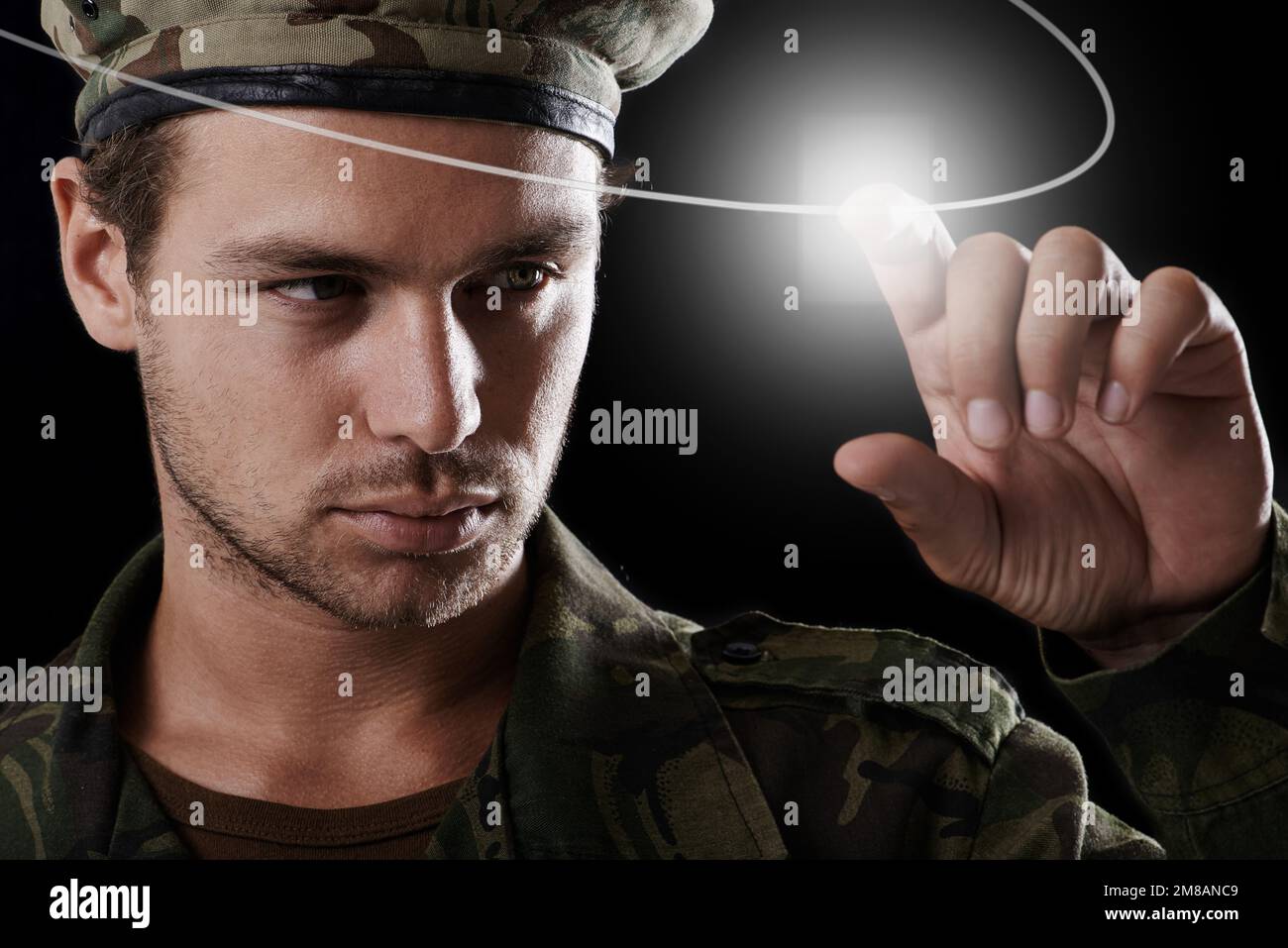 Not every fight occurs on the battlefield. a young man in military fatigues. Stock Photo
