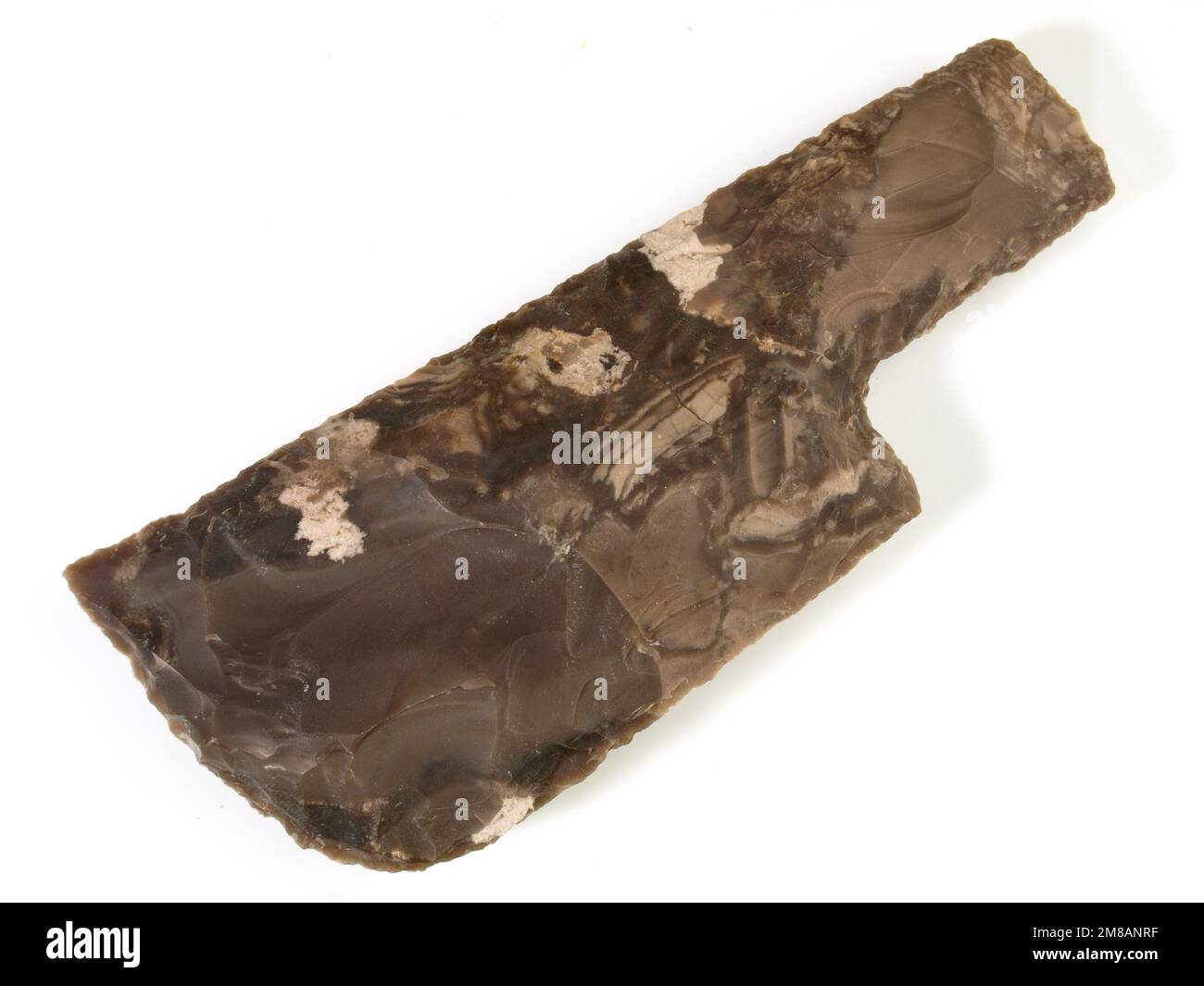 Stone Age Flint Stone Knife Blade isolated on white Background Stock